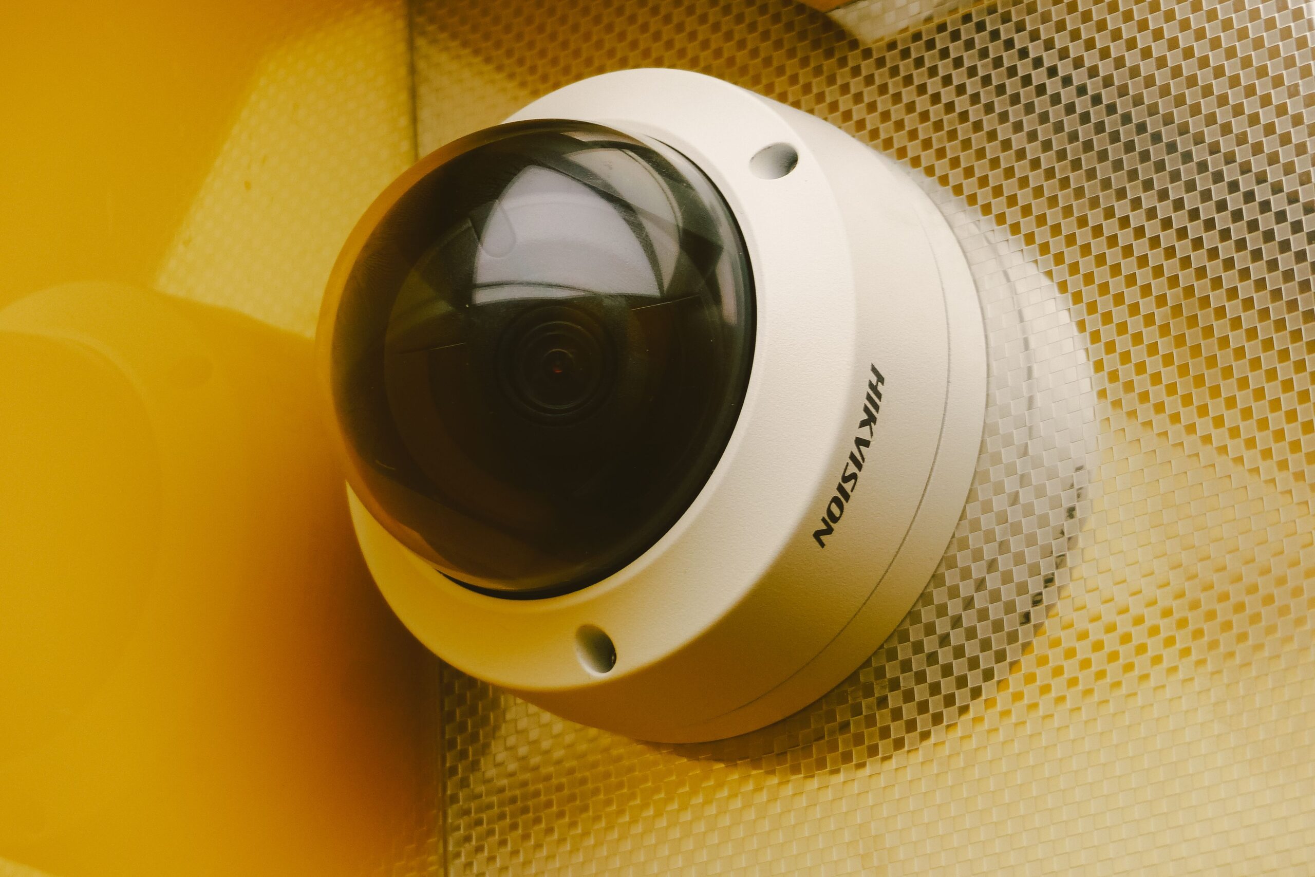 pexels-photo-5966513-5966513 From below of modern camera for recording audio and video in building for security and protection